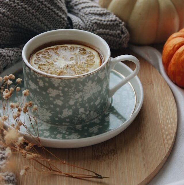 Rustic kitchen with fresh bread and herbal tea, embodying the essence of cottagecore slow living.